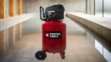 PORTER CABLE PXCMF220VW air compressor against industrial backdrop