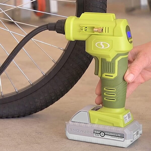 sun joe portable air compress inflating a bicycle tire